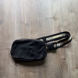 NWOT Lululemon Black/Gold Belt Bag
